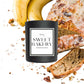 Sweet Bakery Banana Nut Bread Candle, emanating a delightful aroma reminiscent of freshly baked treats. This scented candle offers a gourmet appeal, infusing your space with the sweet, comforting essence of banana and nut bread. Perfect for creating a cozy and inviting ambiance for moments of relaxation and indulgence.